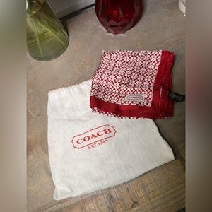 COACH Signature Print Silk Square Scarf in red.